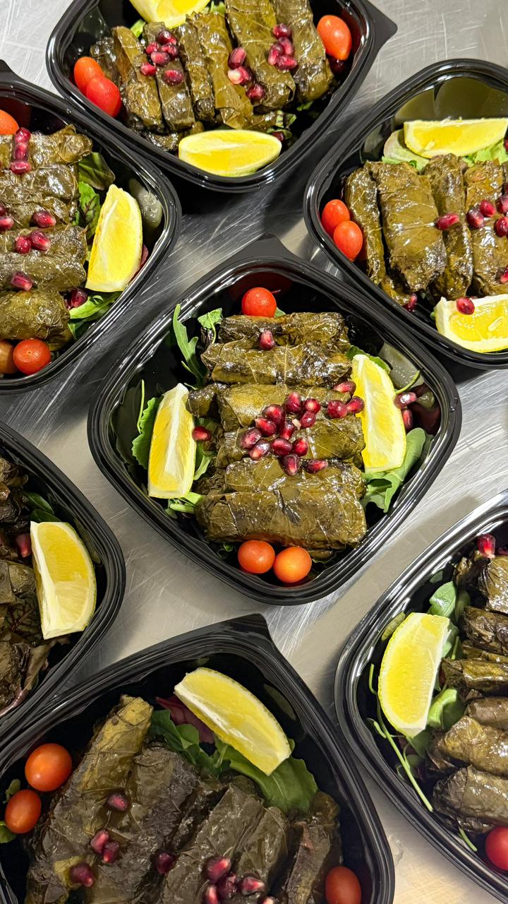 Warak enab stuffed vine leaves with pomegranate and lemon