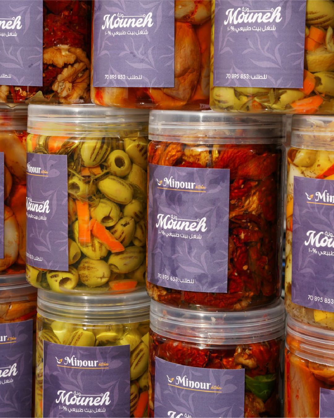 Minour Kitchen Mouneh jars with olives and pickled vegetables